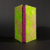 Spine view of pink and green floral batik octavo Coptic book