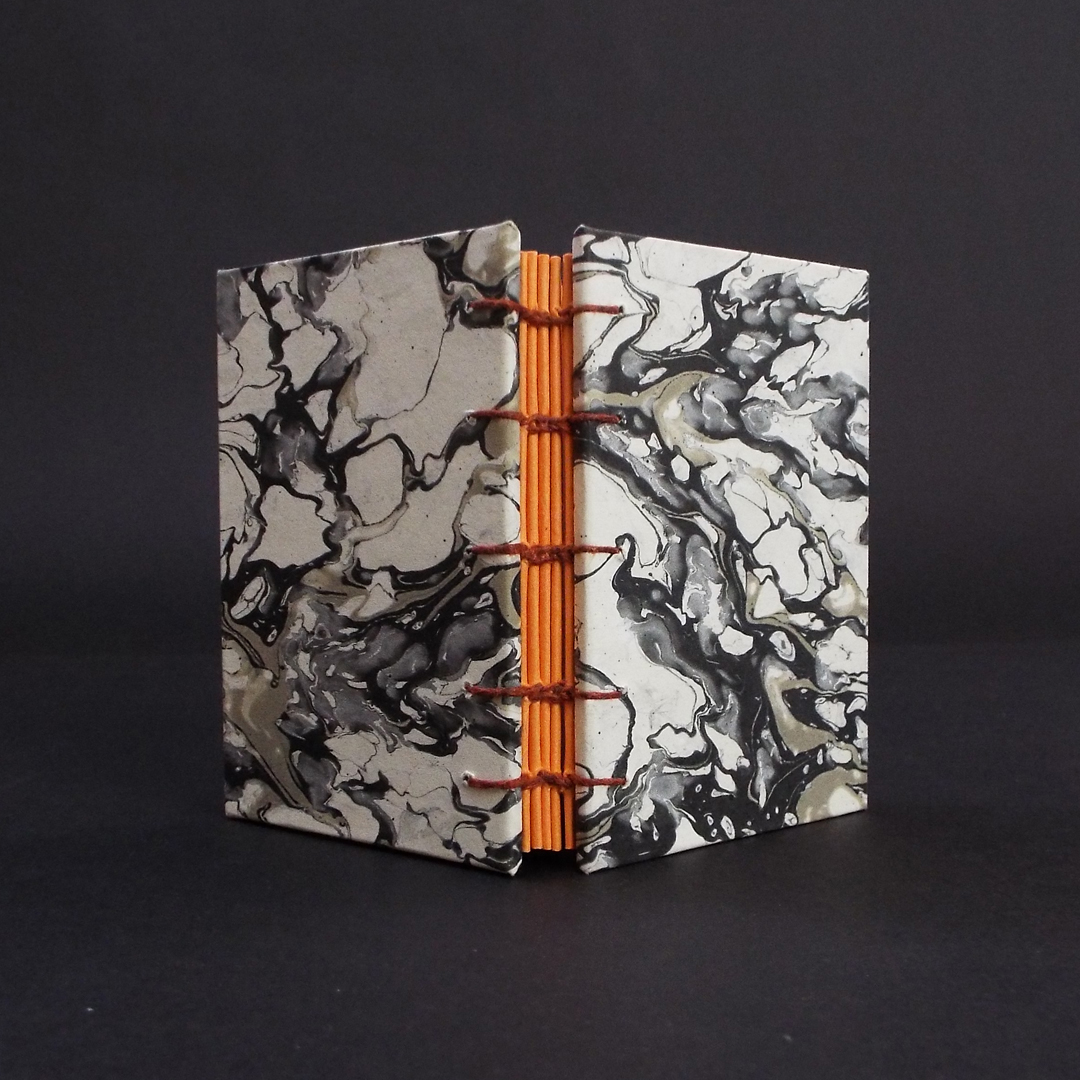 Black marbled mini coptic bound book spine