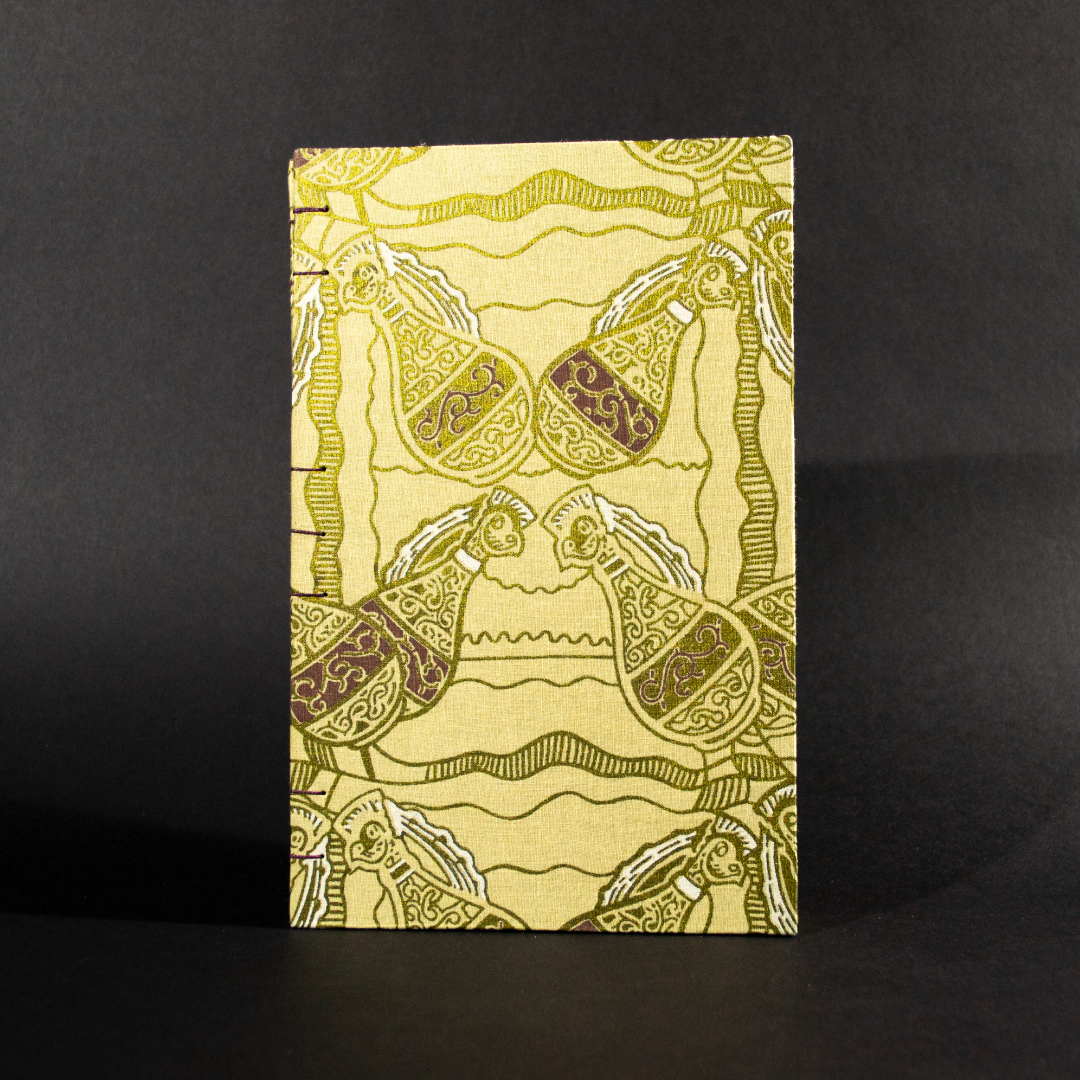 Front cover of four jugs lined quarto Coptic bound journal with gold jugs on an ivory background