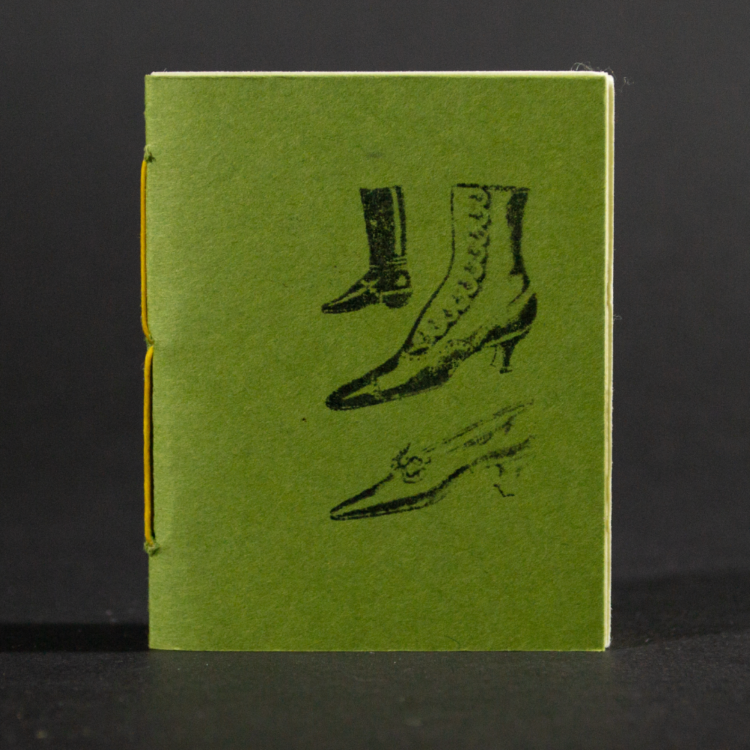Three women's vintage shoes grace the green front cover of this mini pamphlet book