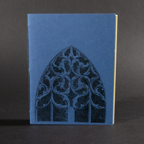 An arched window is on the cover of this blue octavo pamphlet book