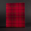 Front view of red plaid octavo Coptic bound journal with inside white end pages and text pages