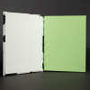 Insides of cow octavo Coptic book showing the green cardstock insides and white end pages