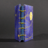 Spine view of celestial mini Coptic book