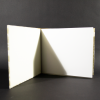 Stab bound floral photo album insides with white card stock inside and end pages